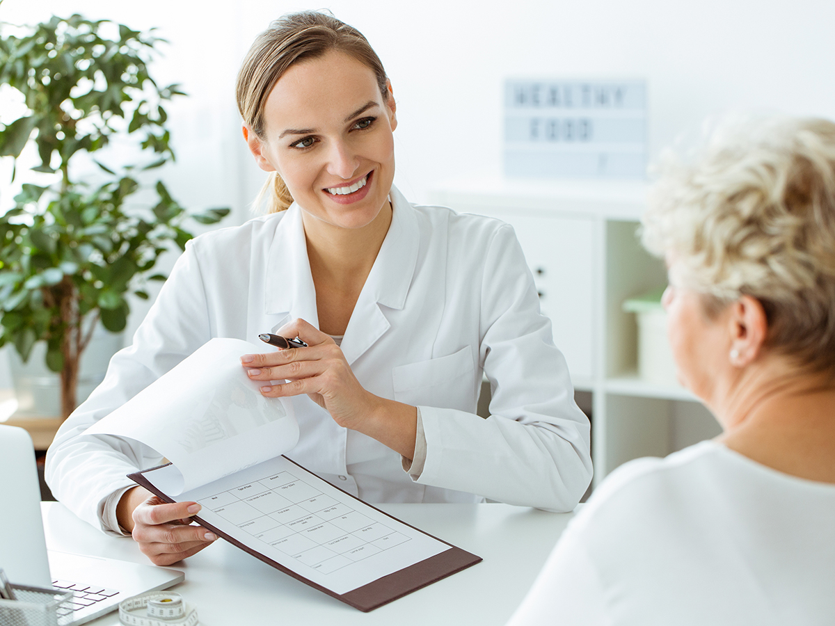 Smiling doctor during medical examinations